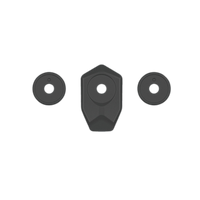 Three black rubber grommets on a white background
