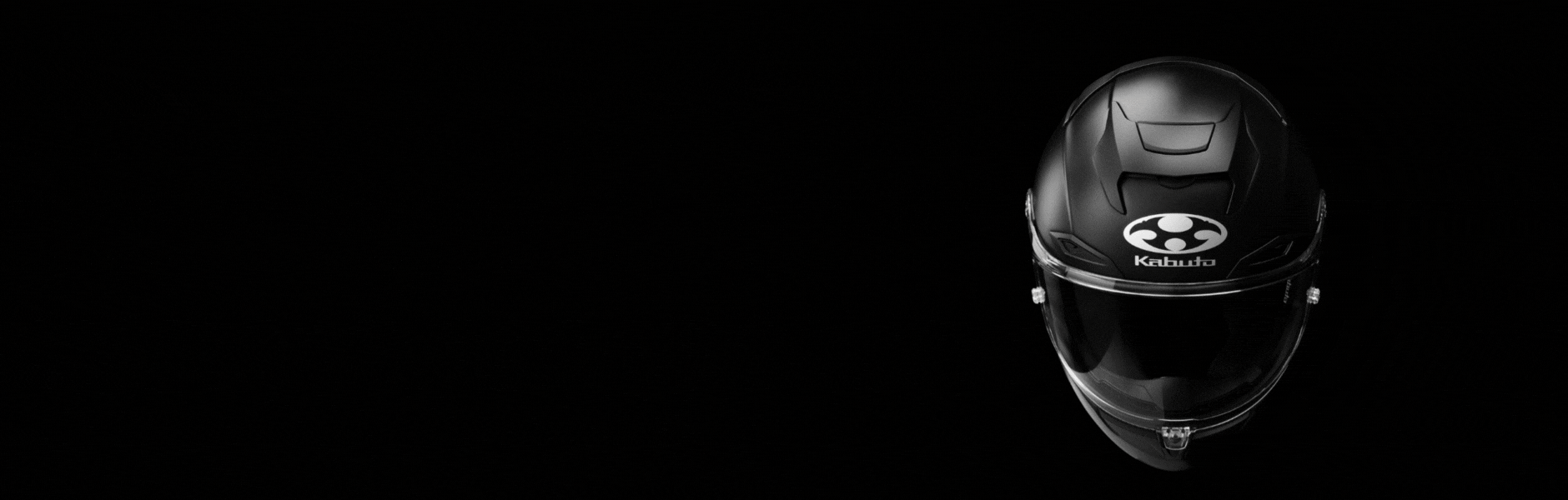 A high-resolution product photograph of a full-face motorcycle helmet styled as a traditional Japanese samurai kabuto switching between that and a normal kabuto f-17 black helmet, centered against a solid black studio backdrop. The helmet is shot straight-on at eye level with shallow depth of field, keeping the subject razor-sharp while the background falls into complete darkness