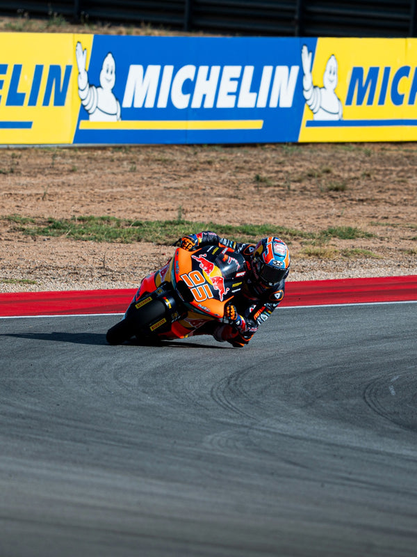 Red Bull KTM rider leaning into a corner