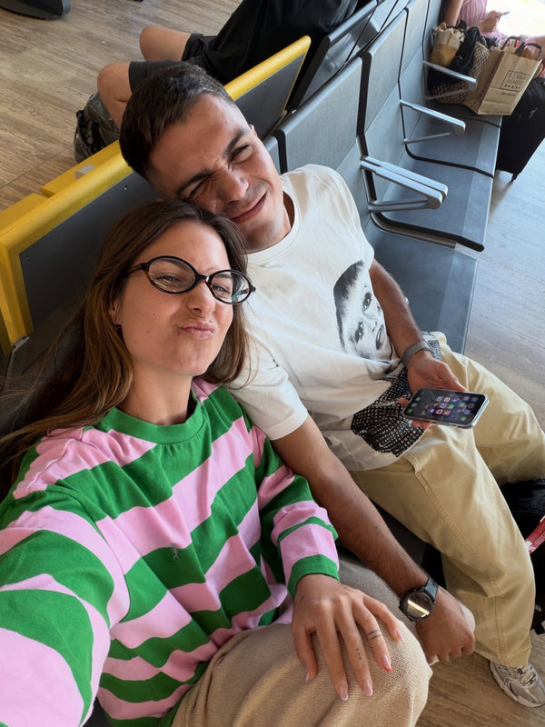 Two people sitting in stadium seats
